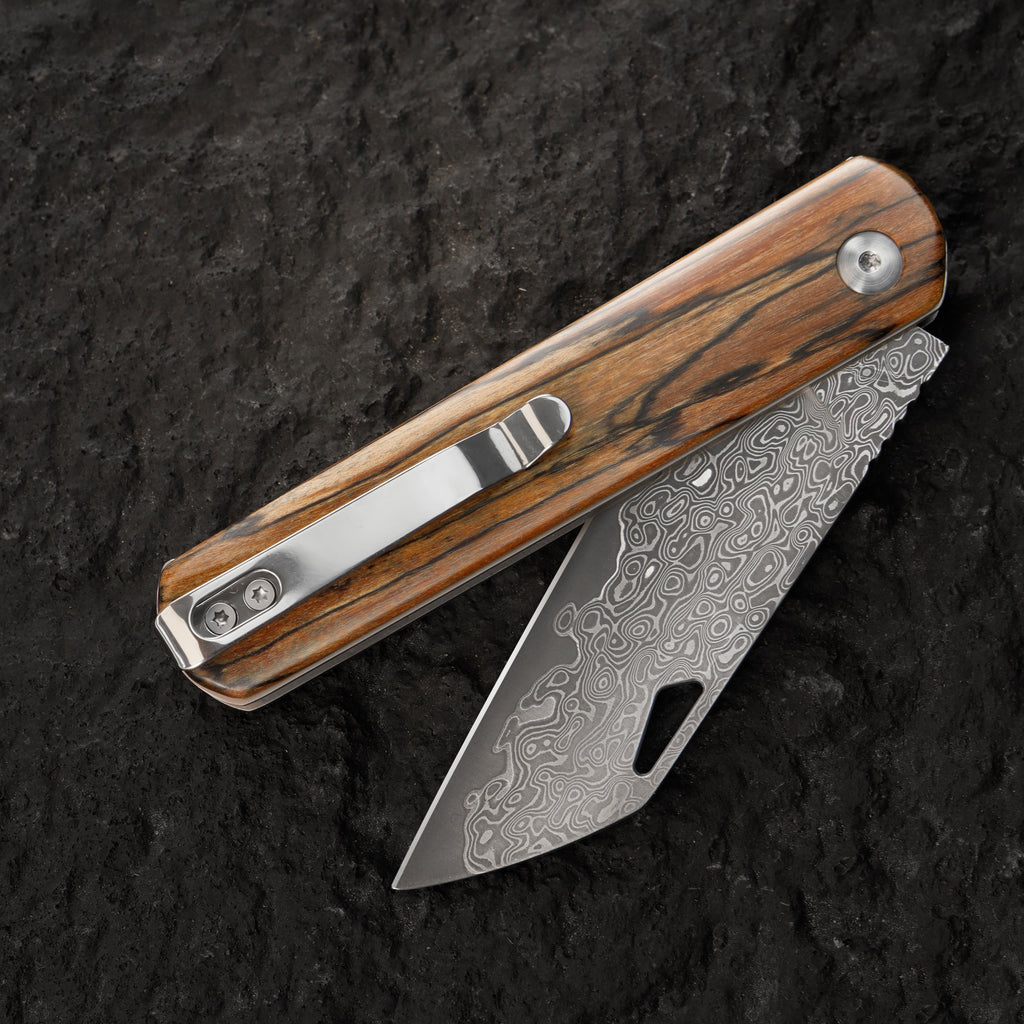 Damascus steel folding knife with wooden handle, vintage style