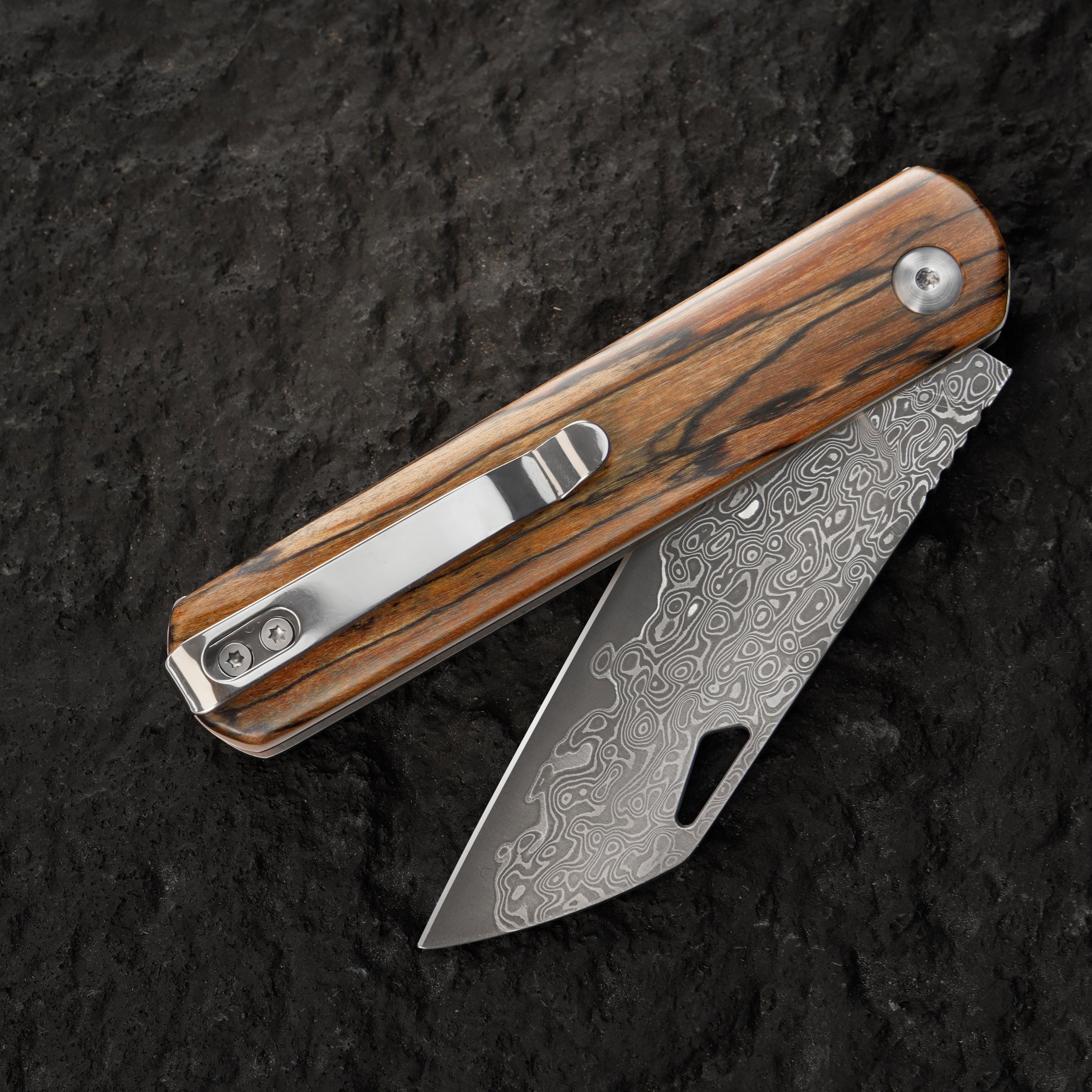 Damascus steel folding knife with wooden handle, vintage style